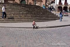 Plaza de Armas, Child in Traditional Dress with a Puppy