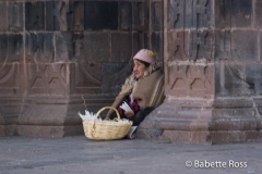 Woman in Traditional Dress at the Cathedral