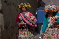 Women in Traditional Dress with Llama