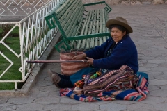 Woman in Traditional Dress Weaving in San Blas