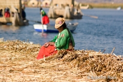 Uros Woman in Traditional Dress and Tortora Reed Huts